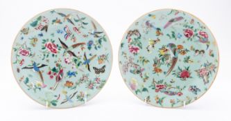 A pair of celadon ground Cantonese plates, each decorated with birds, butterflies,