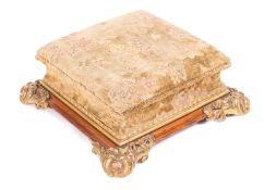 A William VI or early Victorian carved and parcel gilt oak footstool,