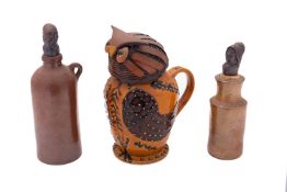 Two stoneware bottles with matched stone