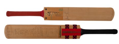 Two signed cricket bats. Comprising A Br