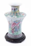 A Chinese porcelain vase decorated in th