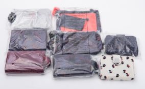 Kipling. A collection of various purses,