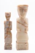 A collection of carved stone artefacts i