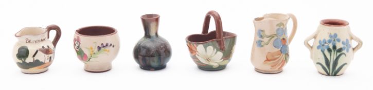 A collection of Devon pottery miniatures