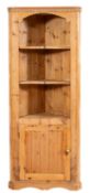 A Pine corner cabinet, mid 20th century;