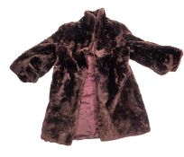 A faux fur coat. In brown and lined with
