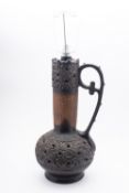 A West German pottery lamp, modelled in