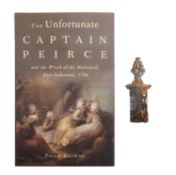 A brass curtain rod final from the wreck of the East Indiaman 'Halesewell',