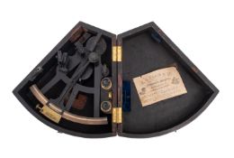 A lacquered brass 9 inch vernier sextant, maker Cox, Devonport, the silvered arc calibrated to 120°,