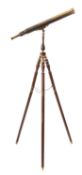 A brass refracting telescope by Brights of Nettlebed.