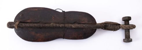 A 18th/ early 19th century ship's fiddle block, with rope work strop, 60cm overall length.