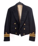 An Elizabeth II Royal Naval Lieutenant Commander's uniform and dress sword,