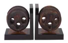 A pair of deadeye bookends.