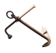 A large cast iron Admiralty pattern anchor. With shank, 158cm long, 104cm wide.