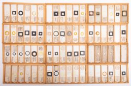 Ten cases of 20th Century mainly botanical microscope slides.