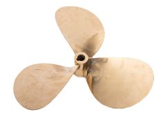 A 20th Century bronze propeller. A three blade example with stamp to the centre, blade length 24cm.