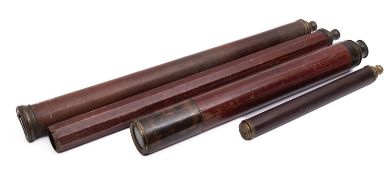 A collection of three single draw brass telescopes.
