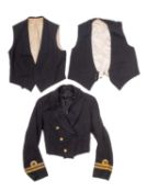 Three 20th Century Royal Navy uniform jackets.