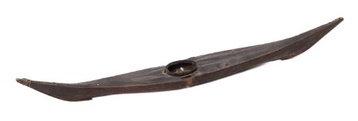 A 19th model of an Inuit canoe, of wood and paper construction with bone runners to fore and aft,