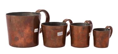 A set of early 20th Century copper Rum mugs, comprising half Gill, Gill,