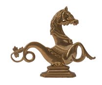 A 20th Century brass Gondela horse, mounted on a plinth, 28cm high.