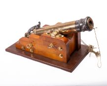 An 19th Century steel and brass line throwing cannon.