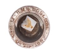 A commemorative steel rivet head inkwell for the Royal Navy Monmouth-class armoured cruiser HMS