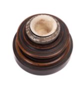 A late 19th century inkwell on wooden stand with steel rivet liner engraved and dated 