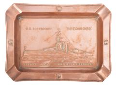 A copper launch commemorative ashtray for the Royal Navy King George V-class battleship HMS