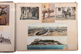 An early 20th Century large cloth bound photograph album documenting a cruise aboard the steam