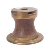 A 20th Century wooden and brass Capstan from a minesweper.