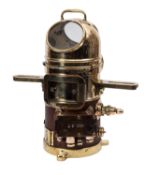 A brass and teak 'Faithful Freddy' binnacle.