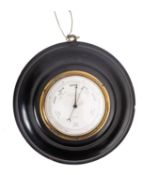 A late 19th century ebony mounted aneroid barometer , maker William Weichert, Bute Docks, Cardiff,