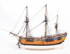 A scale model of the Royal Navy ship HMS 'Endeavour'.