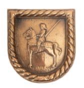 A 20th Century brass ship's badge for HMS 'Vidette'.