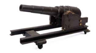 A cast iron model of an Armstrong 100-ton gun.