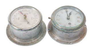 A Sestral chrome plated bulkhead clock and barometer set reputedly from a LLoyd's Of London Yacht