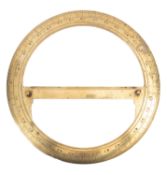 An early 19th century brass protractor, unsigned with central rule and calibrated ring, diameter 29.