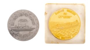 A gilt and resin naming commemorative paperweight for the Lhasa Shipping Ltd,