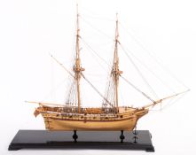 A scale model of an English 12 gun brig.