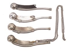 Three regulation pattern bosuns' whistles, with broad arrow stamp and plane vanes, one with chain ,