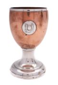 A 19th century Sheffield plate and copper goblet with an applied badge of the Kit-Kat Club, 14.4cm.