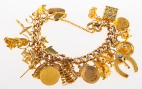 A charm bracelet with charms, a curb link bracelet with heart padlock and safety chain,
