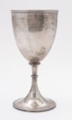 A Victorian silver chalice by Walter & John Barnard, London 1880, beaded rims, plain body, 6.