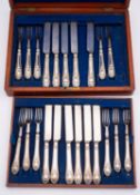 A cased set of eleven silver and close plated dessert knives and fork,