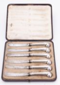A cased set of six Edward VII silver and steel Pistol grip tea knives by George Howson,
