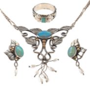 A suite of silver and opal set jewellery handmade by Ann Powell,