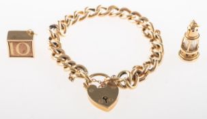 A 9ct gold charm bracelet and two loose charms,