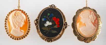 A group of three brooches, including a 9ct gold mounted cameo brooch, safety chain, UK hallmark,