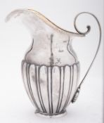 A Russian/ Polish silver water jug by Emile Radke, Warsaw, stamped 84 and Emile Radke in script,